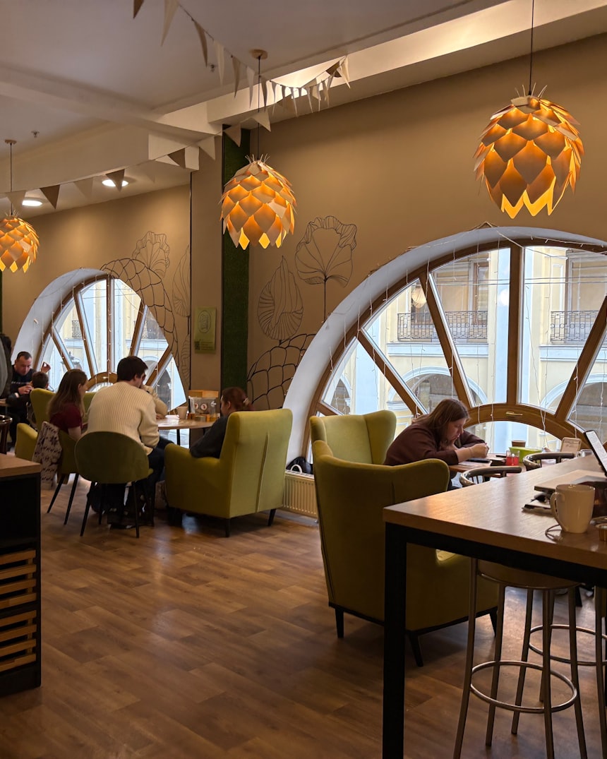 Warm cafe interior with timber furniture and natural light